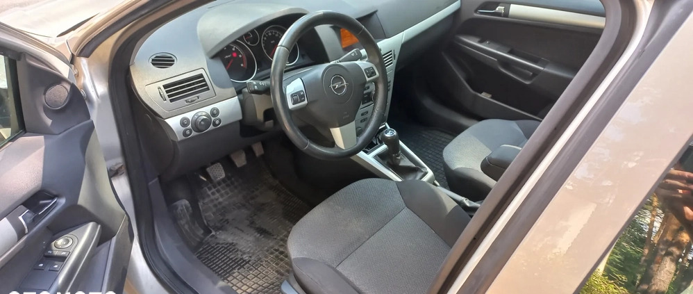 Opel Astra cena 10900 przebieg: 252400, rok produkcji 2009 z Wołomin małe 137